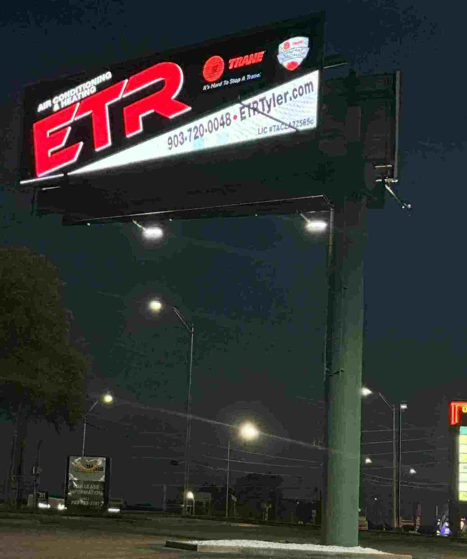 digital billboard in longview texas at night